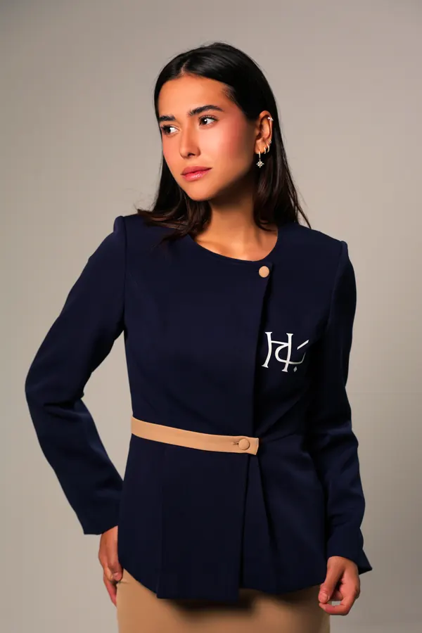 Navy front-office jacket with a tan belt and the Beit Hady logo