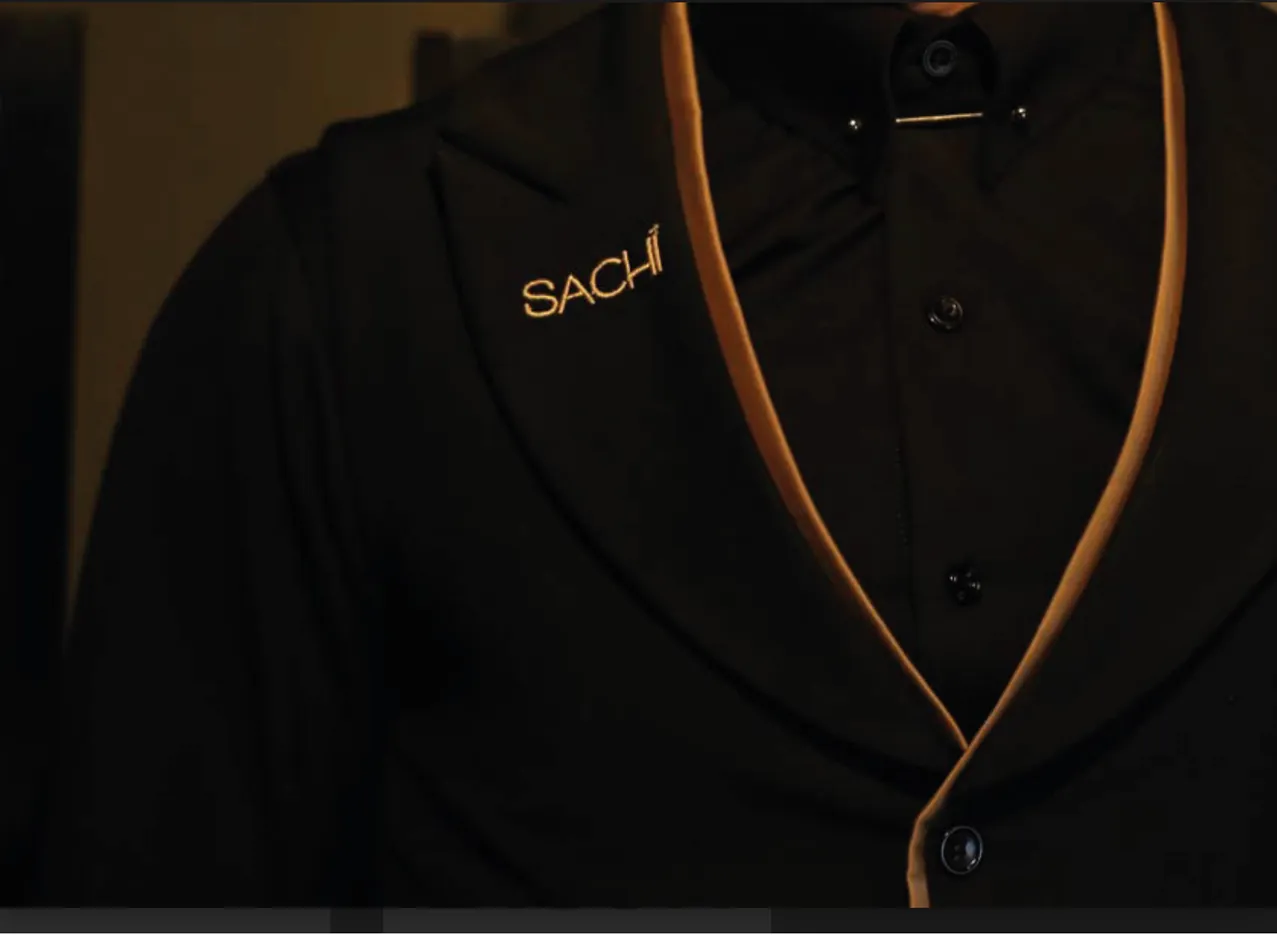 Black Sachi server jacket with copper piping